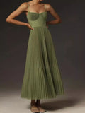 Saoirse Pleated Sweetheart Midi Dress in Green, on model
