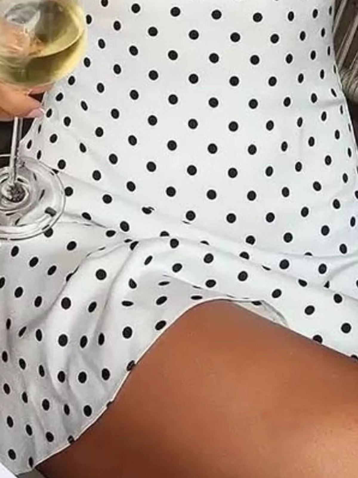 Polly Polka Dot Halter Mini Dress in White, on model