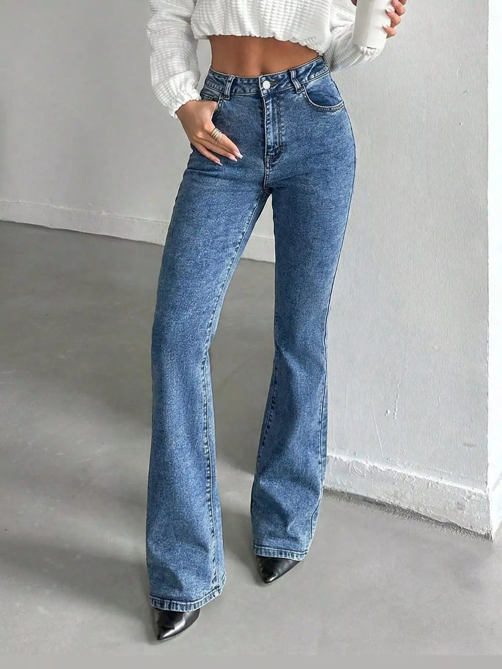 Vera High-Waisted Slim Flare Jeans in Light Blue, on model