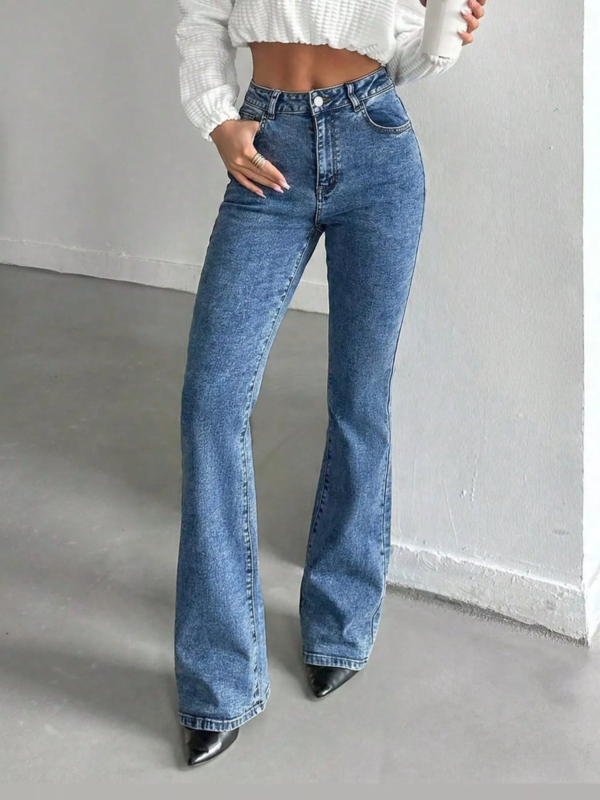 Vera High-Waisted Slim Flare Jeans in Light Blue, on model