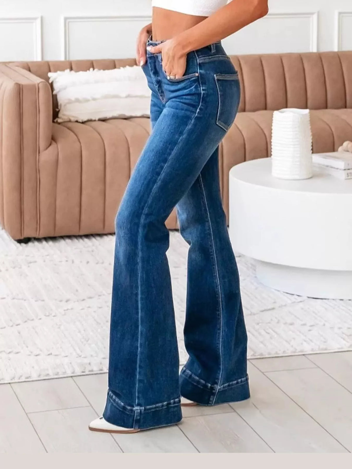 Cleo High-Rise Flare Jeans in Dark Blue, on model