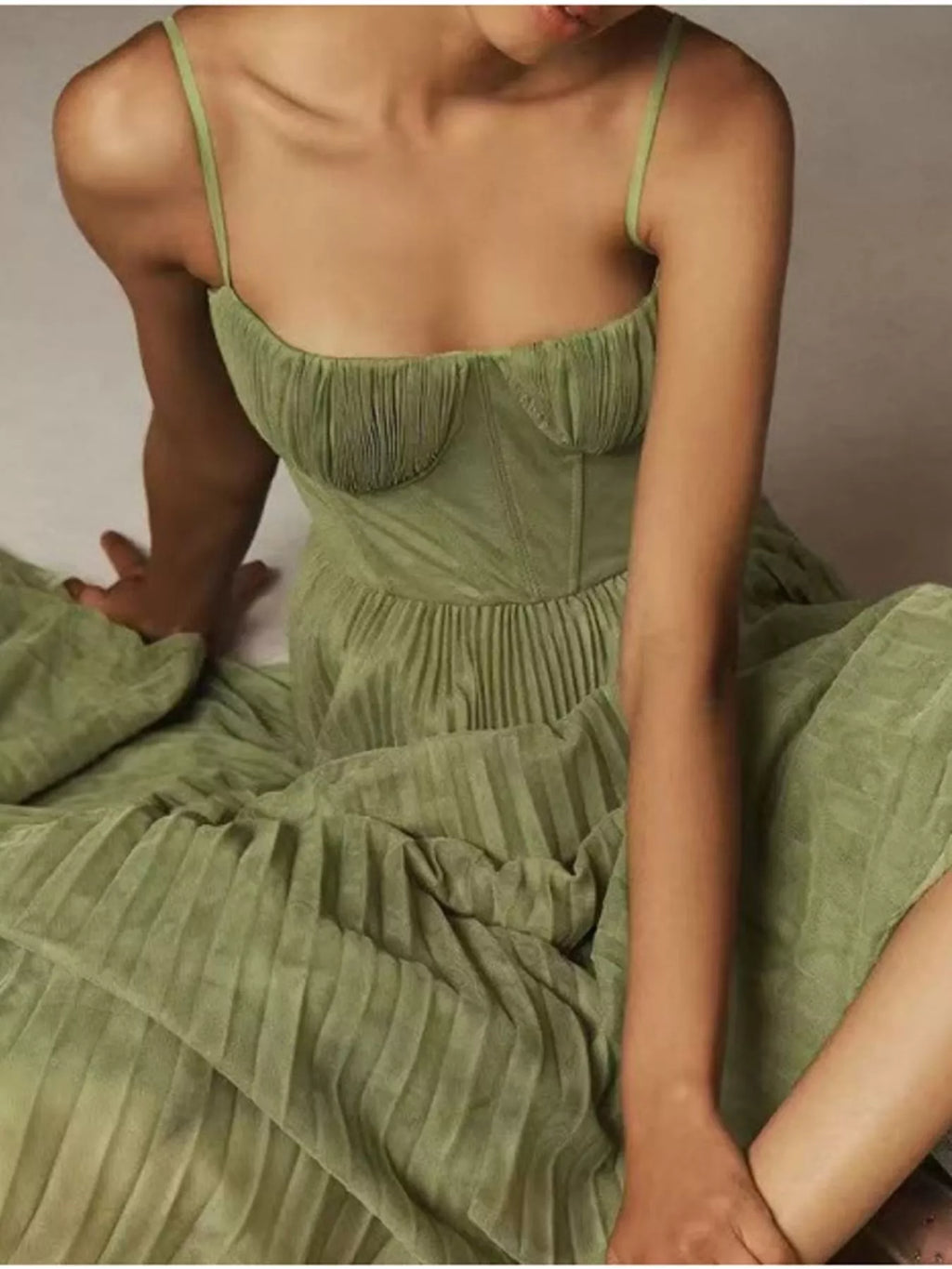 Saoirse Pleated Sweetheart Midi Dress in Green, on model