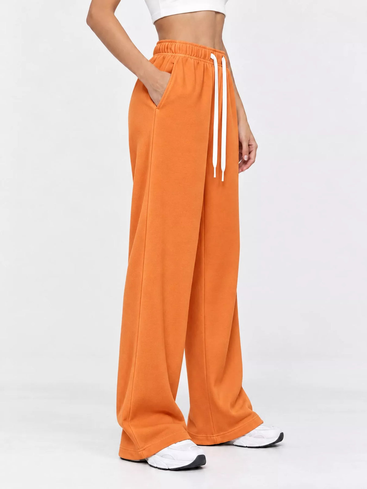 Odessa Drawstring Wide-Leg Sweatpants in Orange, on model