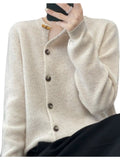 Nell Asymmetric Button Ribbed Cardigan in Pearl Barley, on model