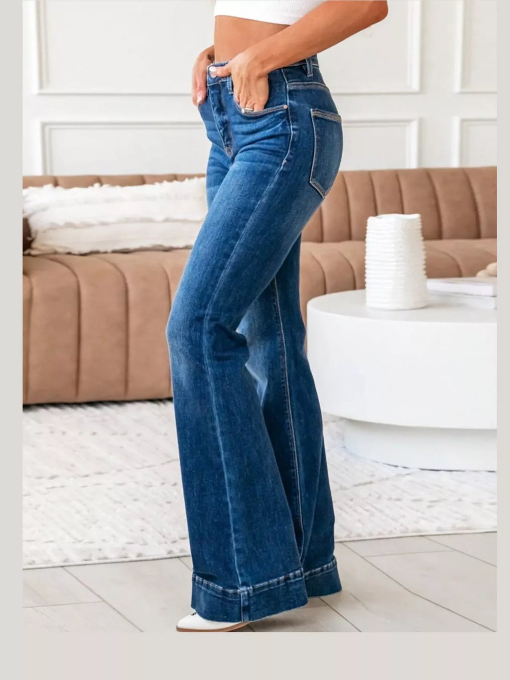 Cleo High-Rise Flare Jeans in Dark Blue, on model