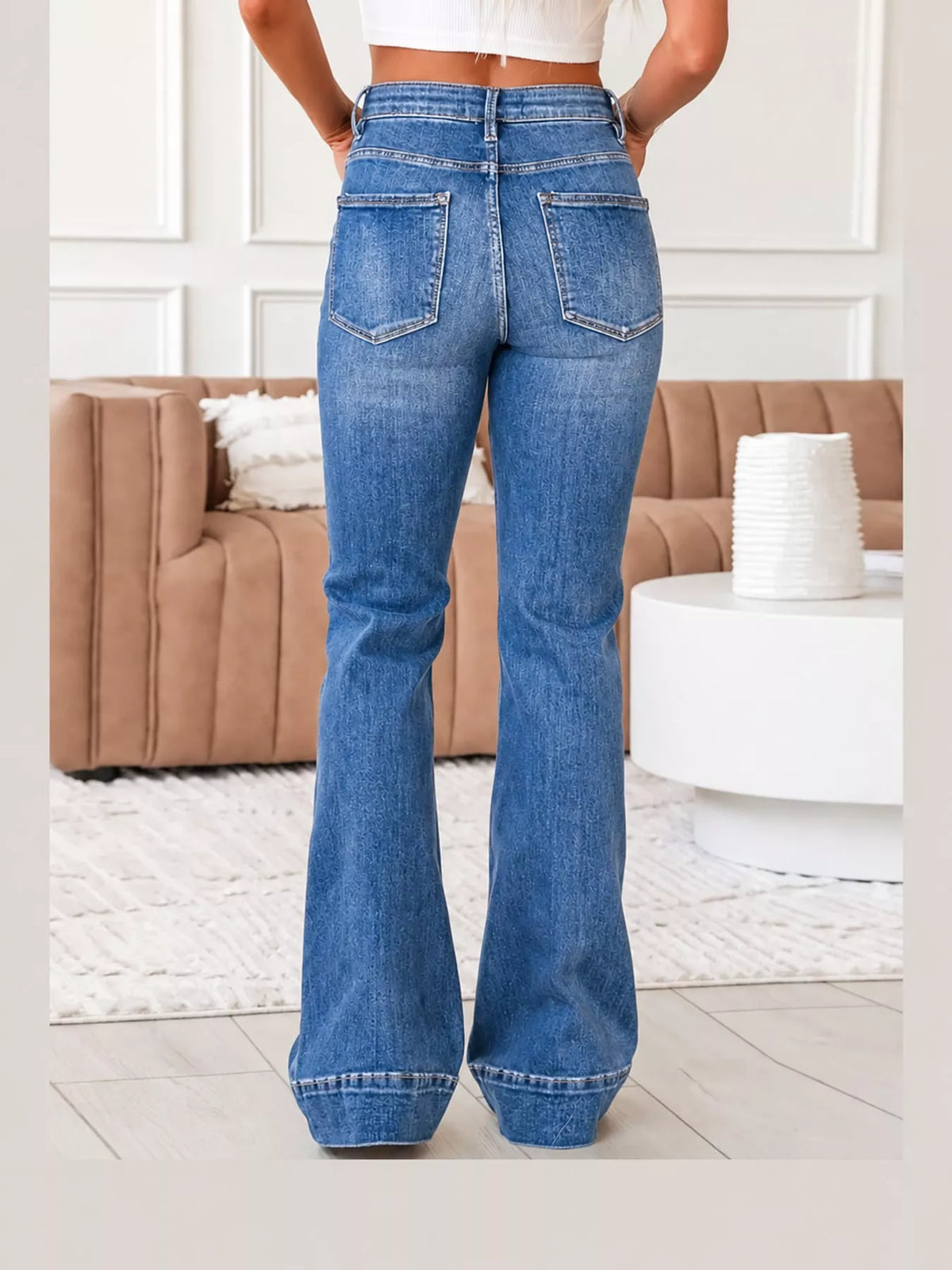 Cleo High-Rise Flare Jeans in Blue, on model