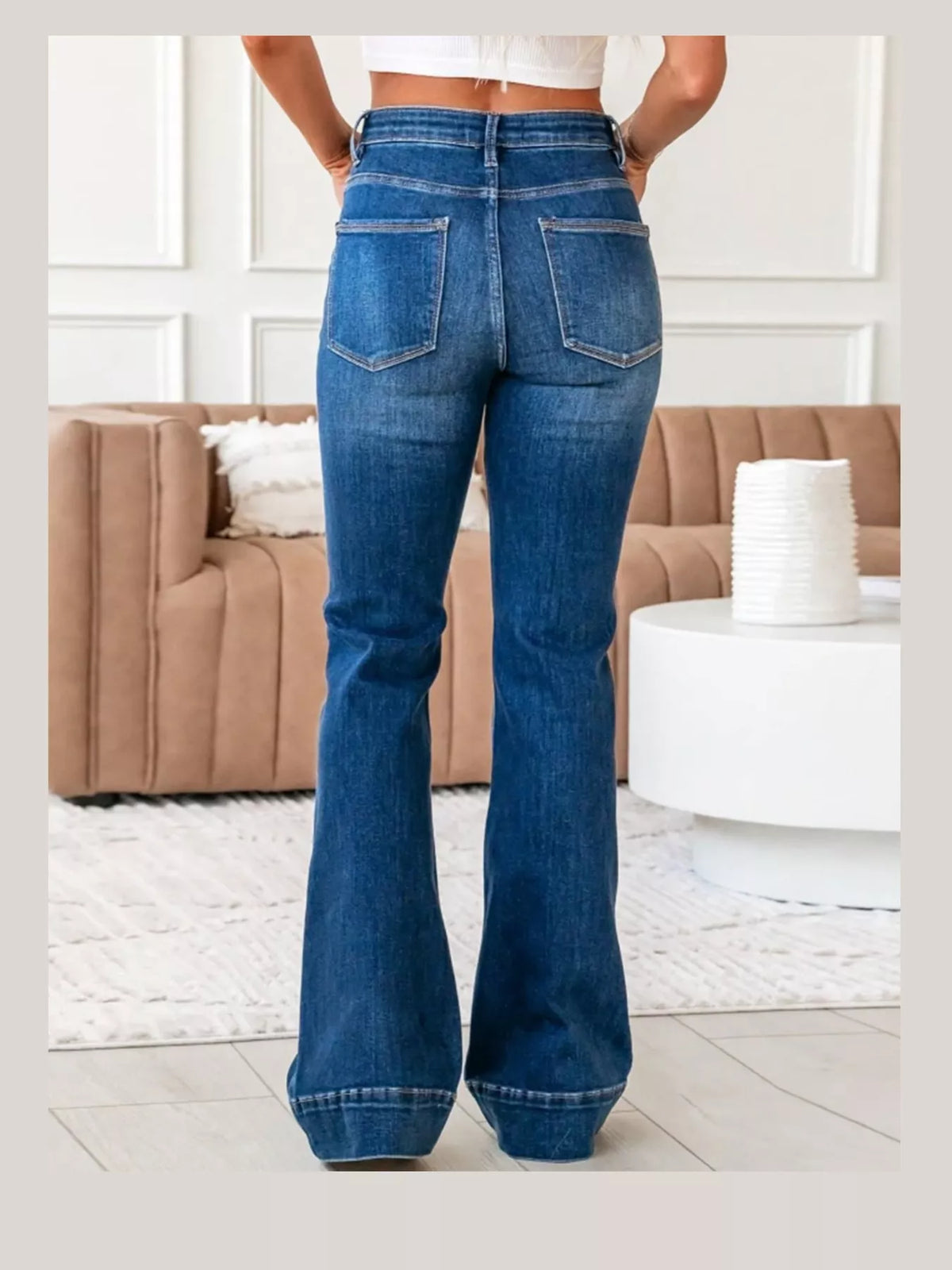 Cleo High-Rise Flare Jeans in Dark Blue, on model