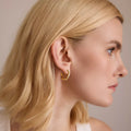 Gemma Gold Zircon Hoop Earrings, worn on model