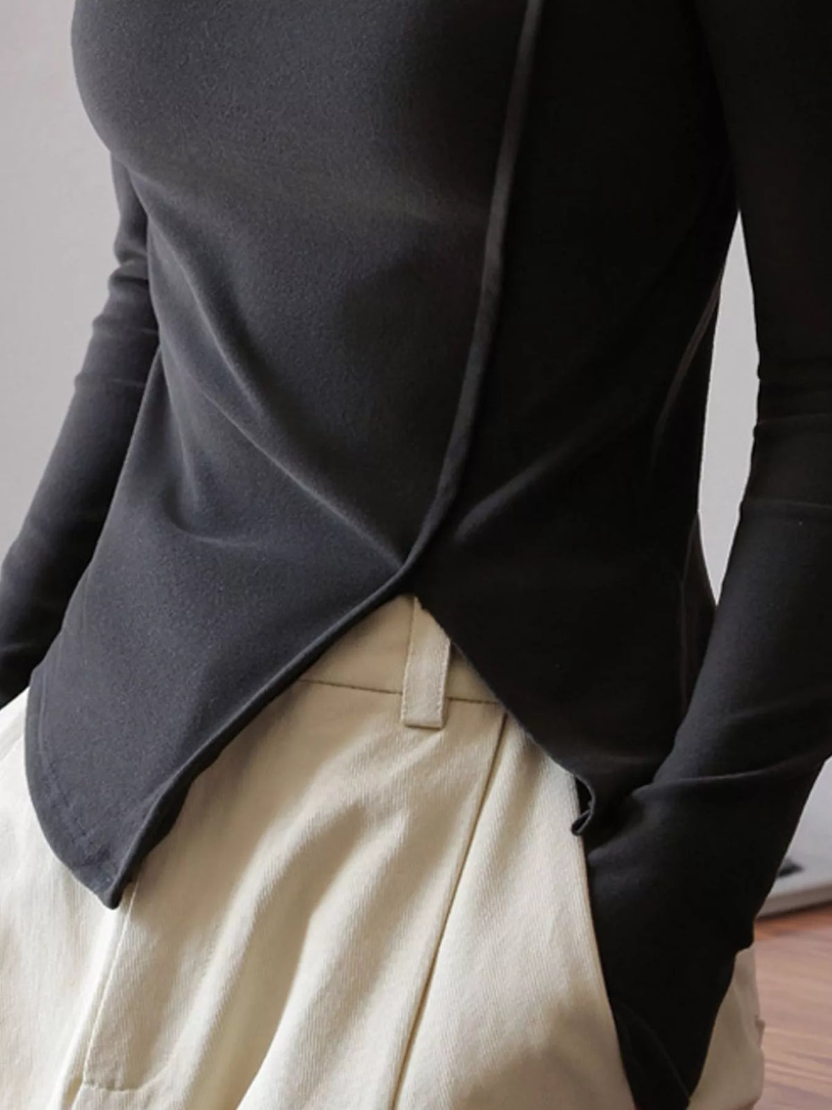 Una Asymmetric Mock-Neck Long-Sleeve Top in Smoke Gray, on model