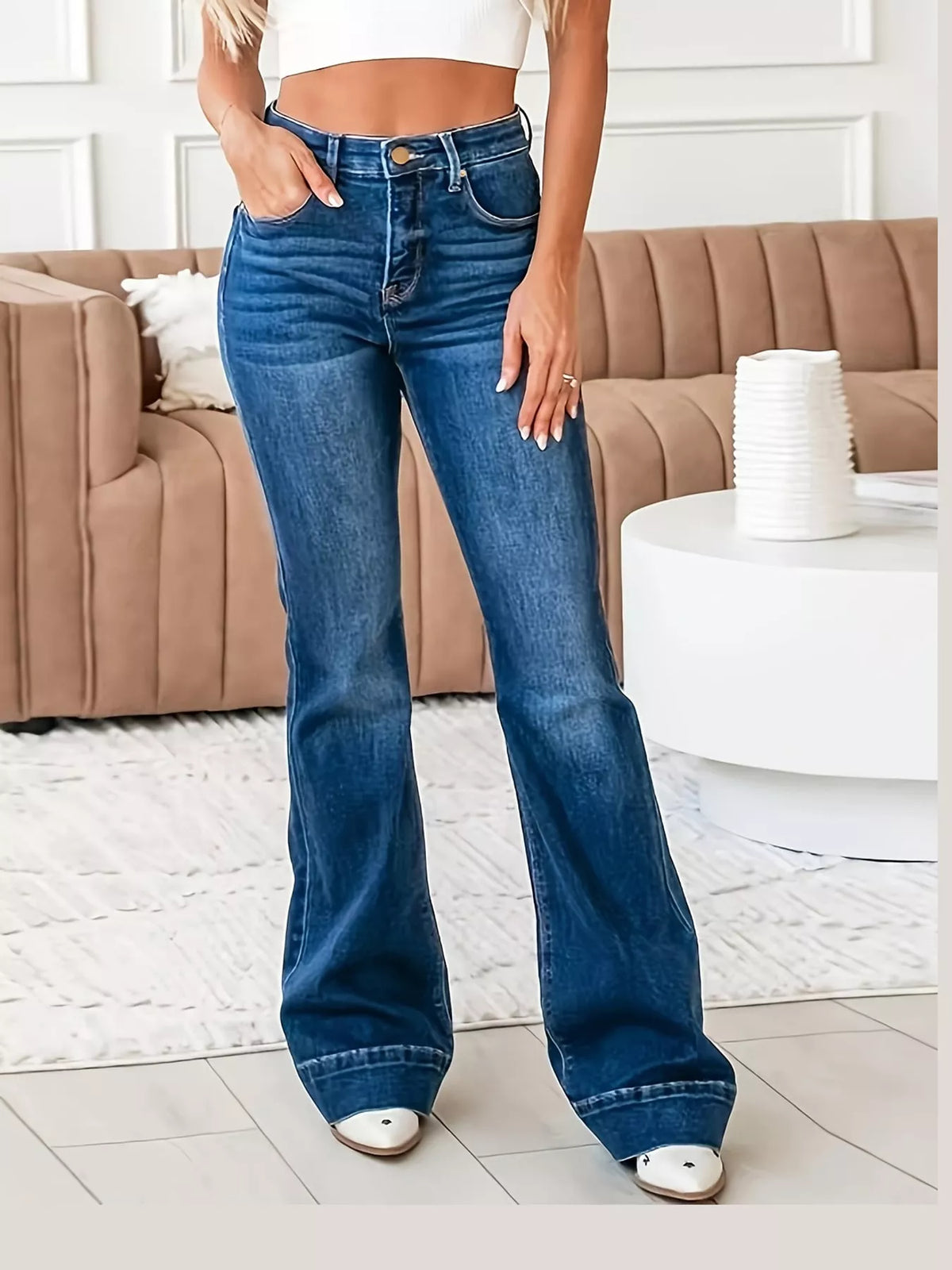 Cleo High-Rise Flare Jeans in Dark Blue, on model