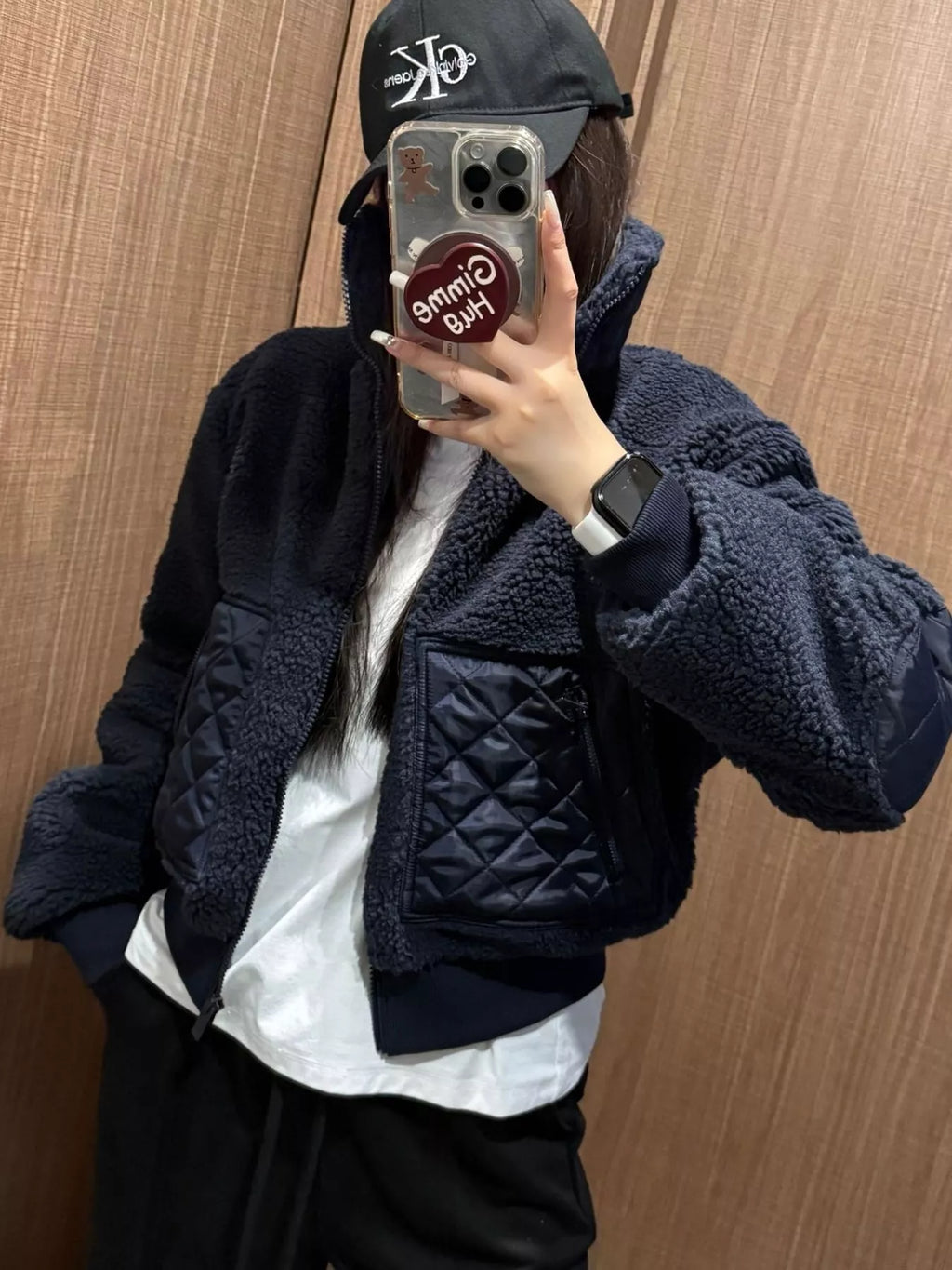 Kiki Sherpa Quilted Zip-Up Jacket in Navy, on model