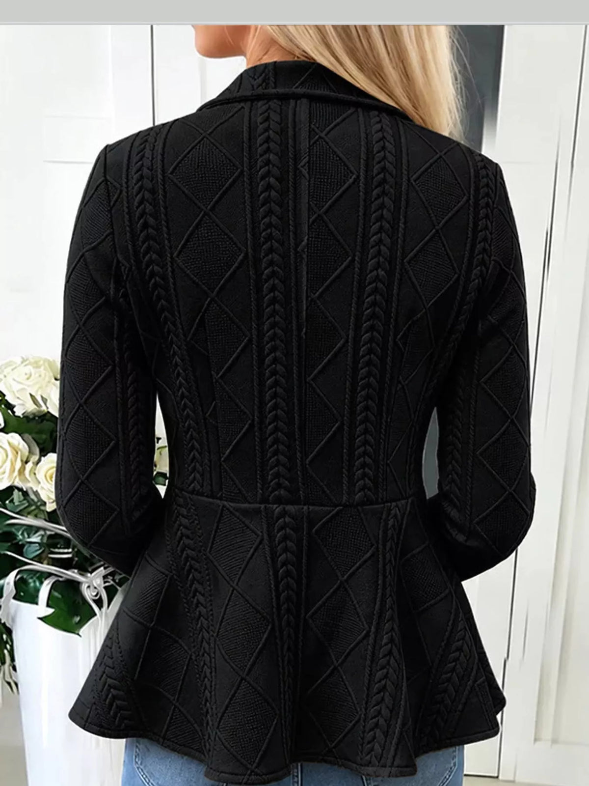 Briar Cable-Knit Peplum Cardigan in Black, on model