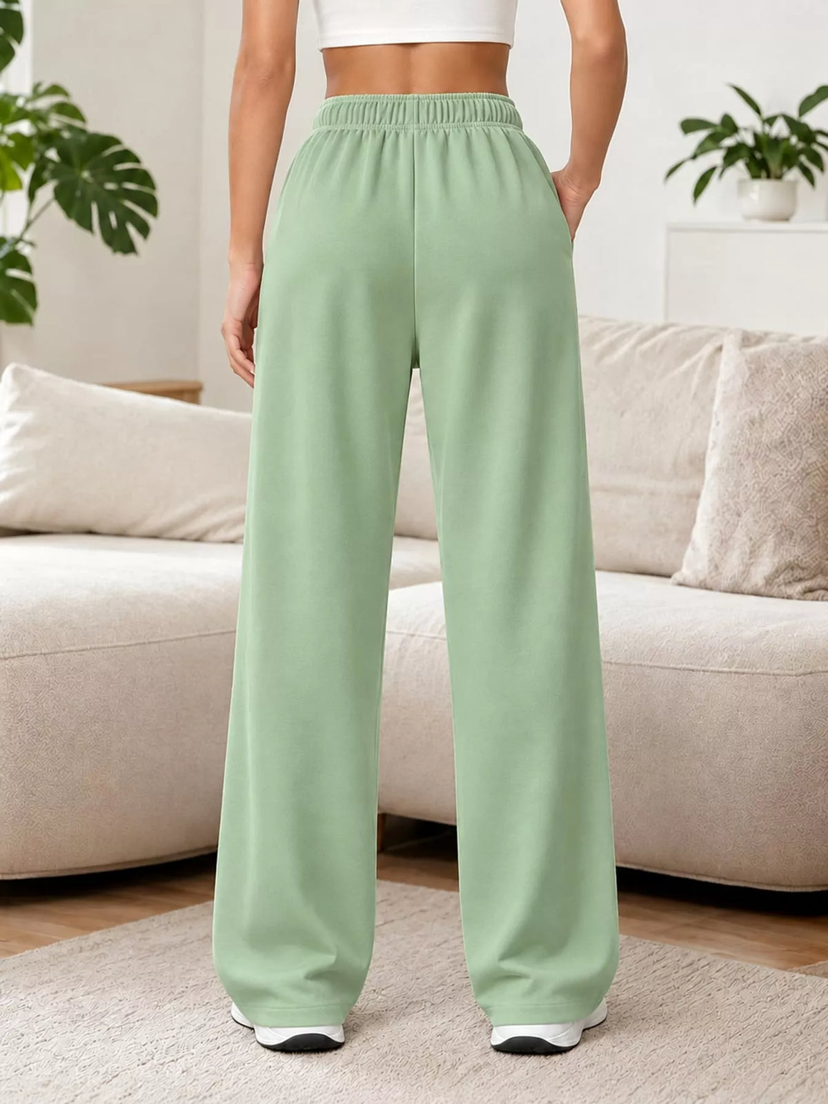 Odessa Drawstring Wide-Leg Sweatpants in Light Green, on model