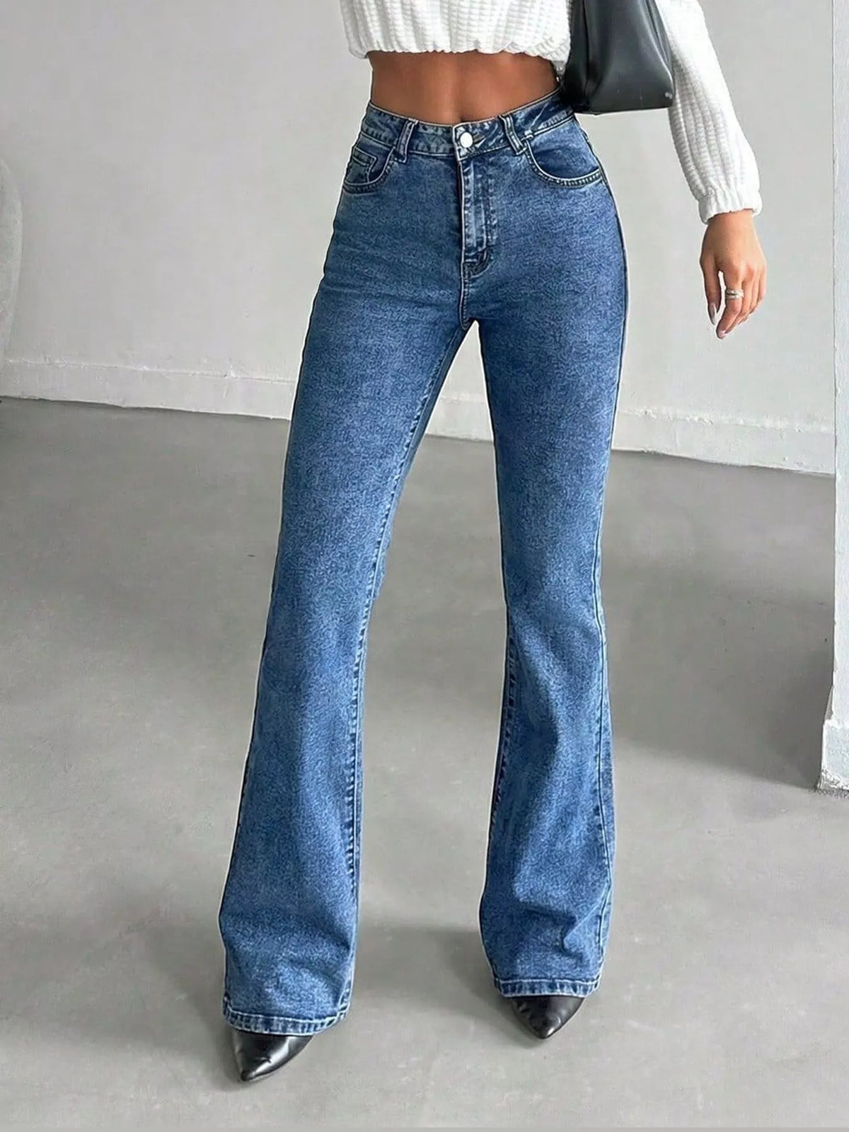 Vera High-Waisted Slim Flare Jeans in Light Blue, on model