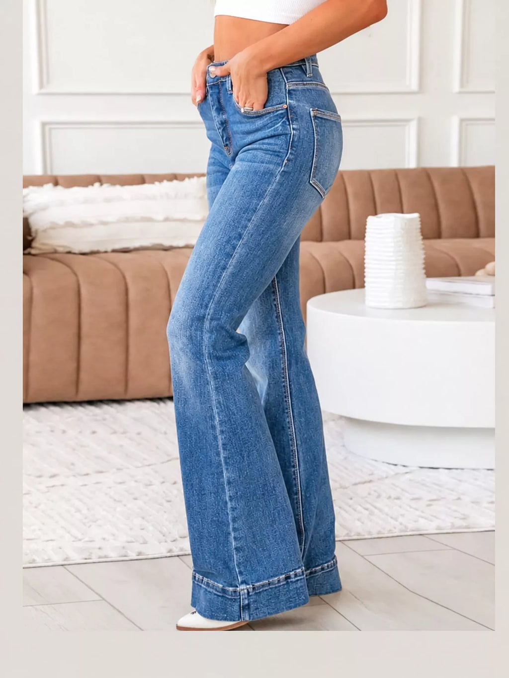 Cleo High-Rise Flare Jeans in Blue, on model