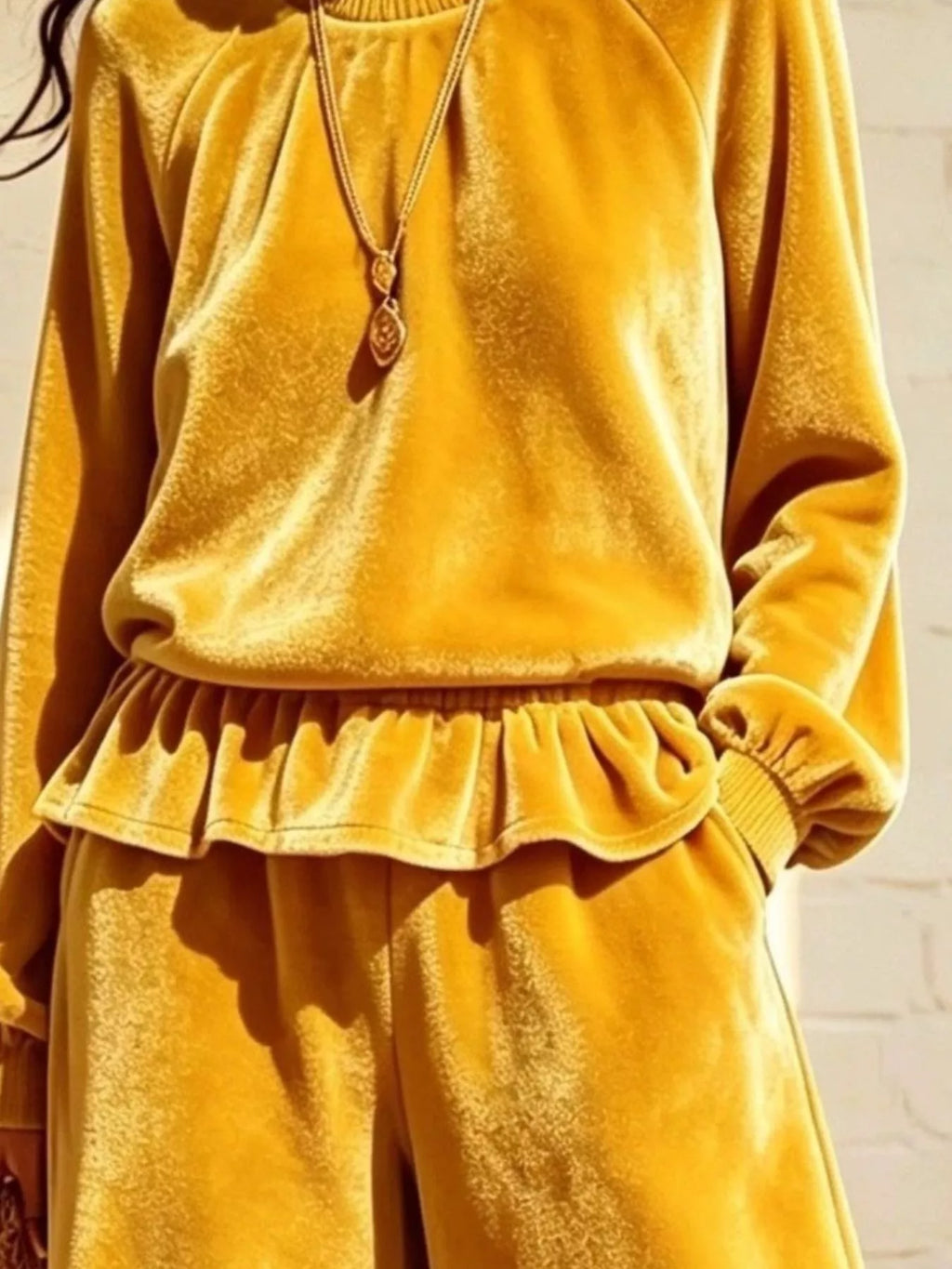 Theodora Velvet Peplum Top + Wide-Leg Pant Set in Gold, on model