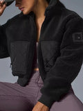 Kiki Sherpa Quilted Zip-Up Jacket in Black, on model
