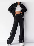 Wynn Piped Zip-Up Jacket + Wide-Leg Pants Set in Black, on model