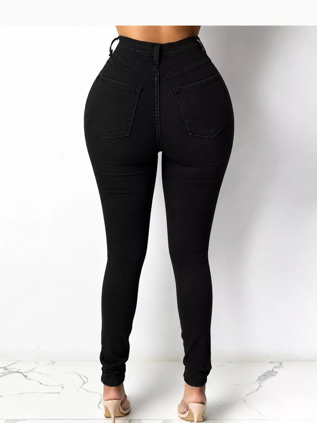 Yvette High-Waisted Skinny Jeans in Black, on model