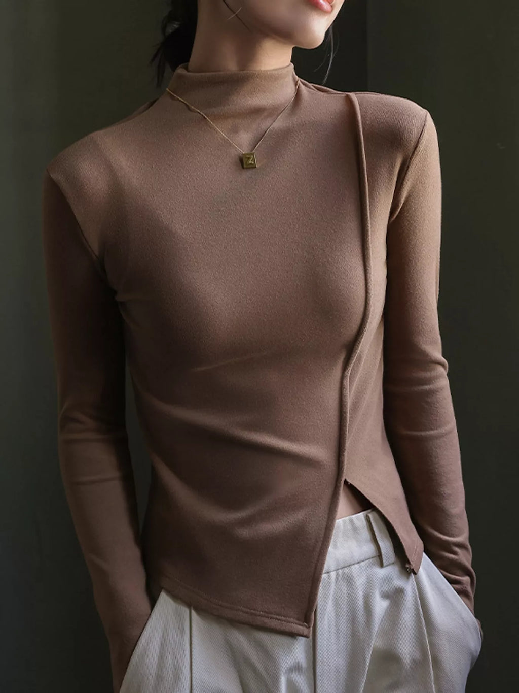 Una Asymmetric Mock-Neck Long-Sleeve Top in Khaki, on model