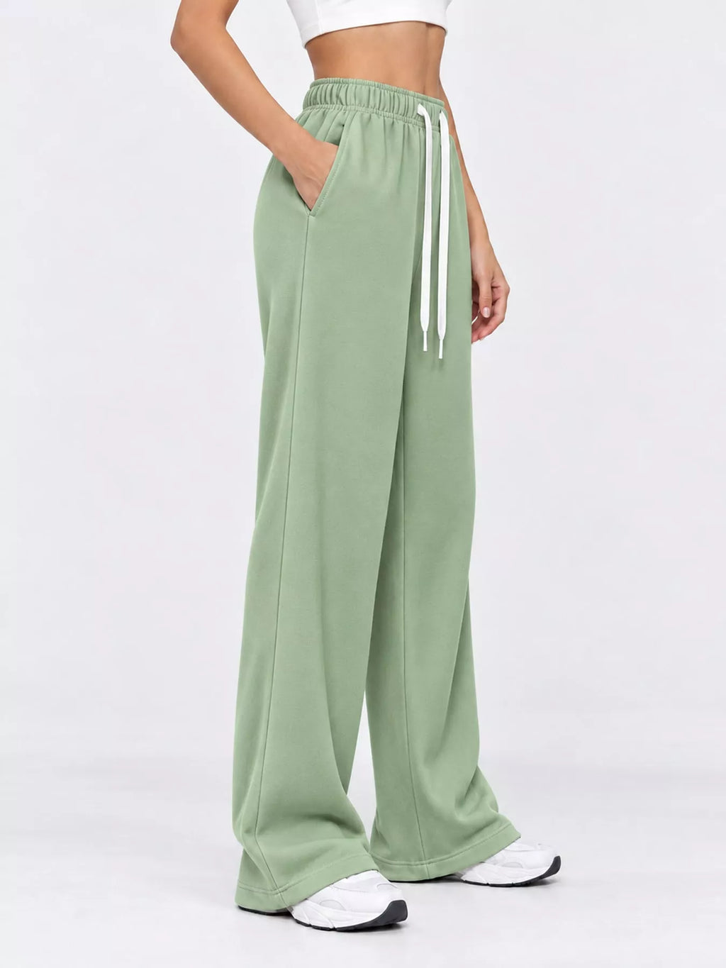 Odessa Drawstring Wide-Leg Sweatpants in Light Green, on model
