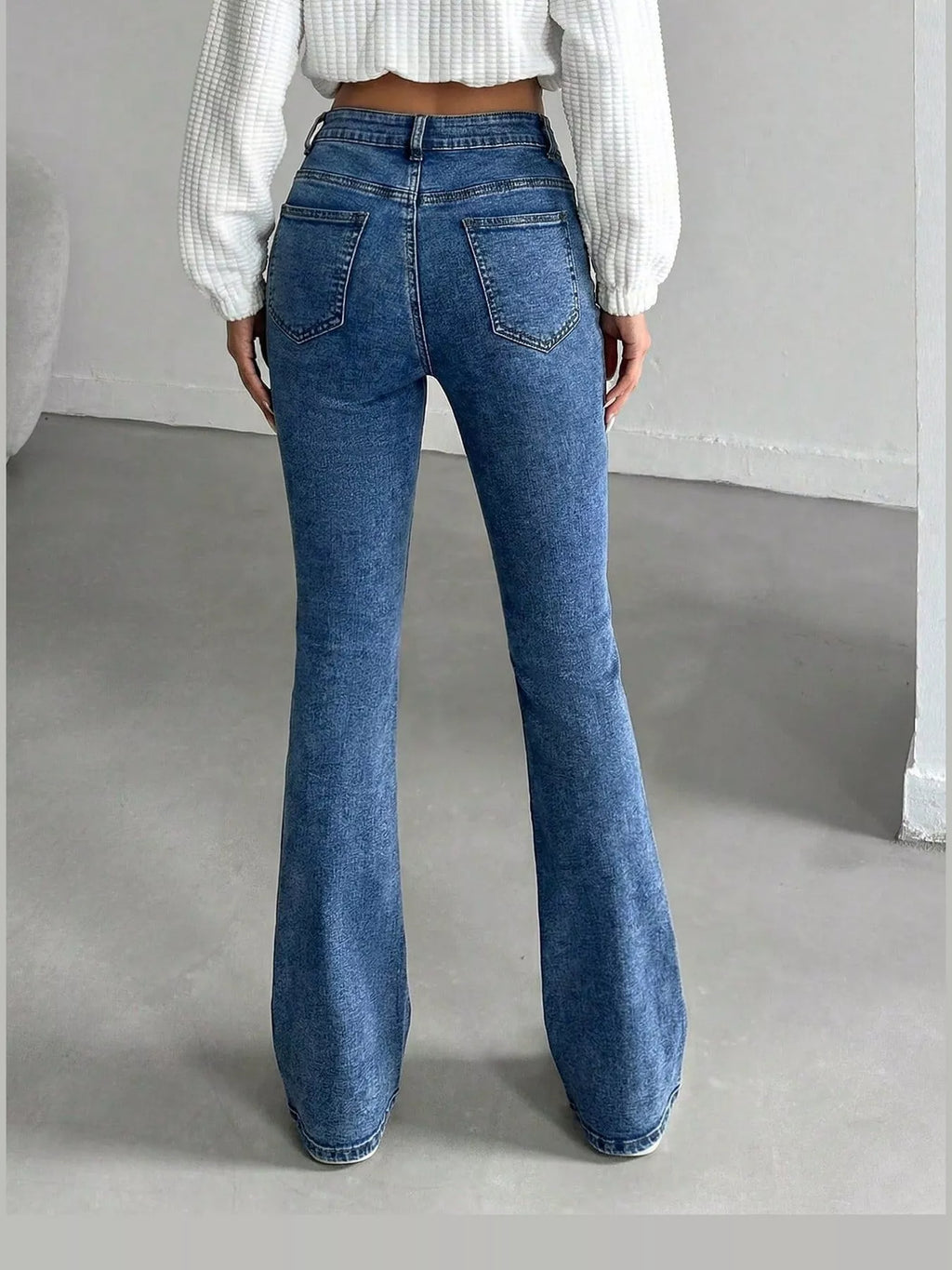 Vera High-Waisted Slim Flare Jeans in Light Blue, on model