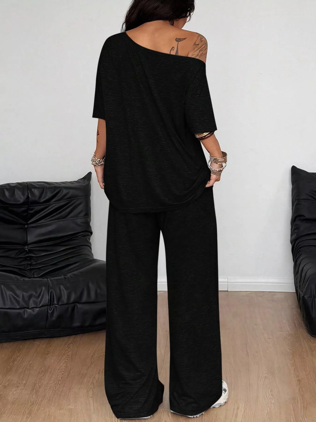 Linnea Off-Shoulder Top + Wide-Leg Pants Set in Black, on model