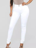 Yvette High-Waisted Skinny Jeans in White, on model