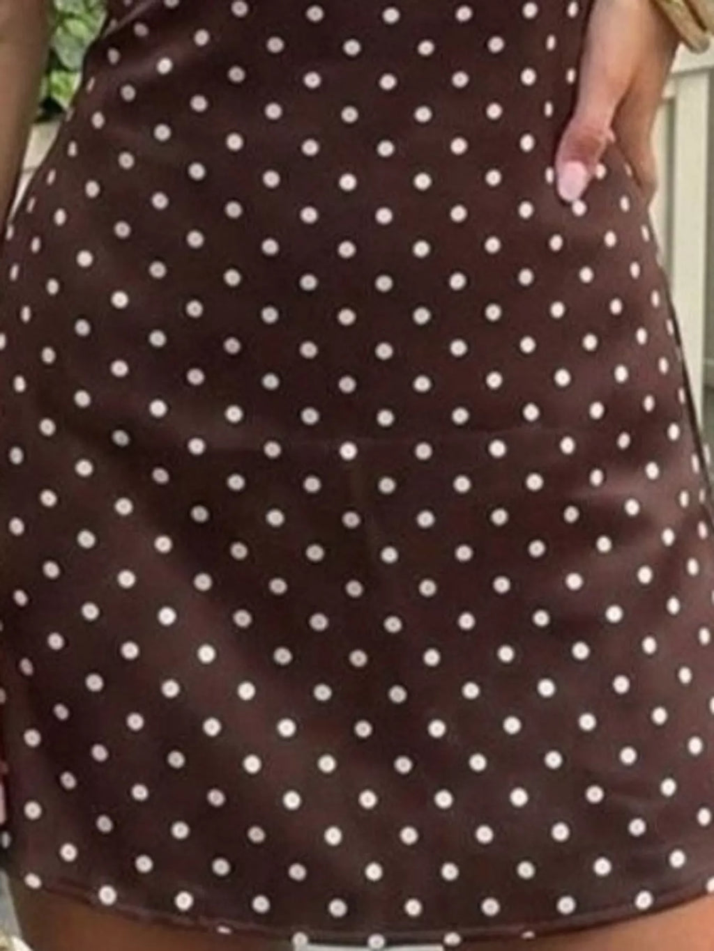 Polly Polka Dot Halter Mini Dress in Brown, on model