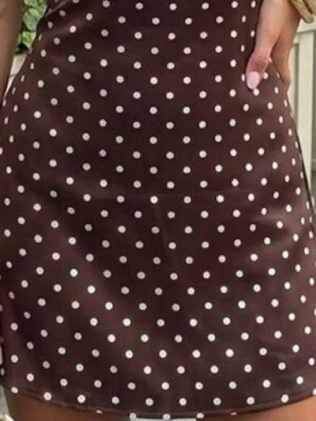 Polly Polka Dot Halter Mini Dress in Brown, on model