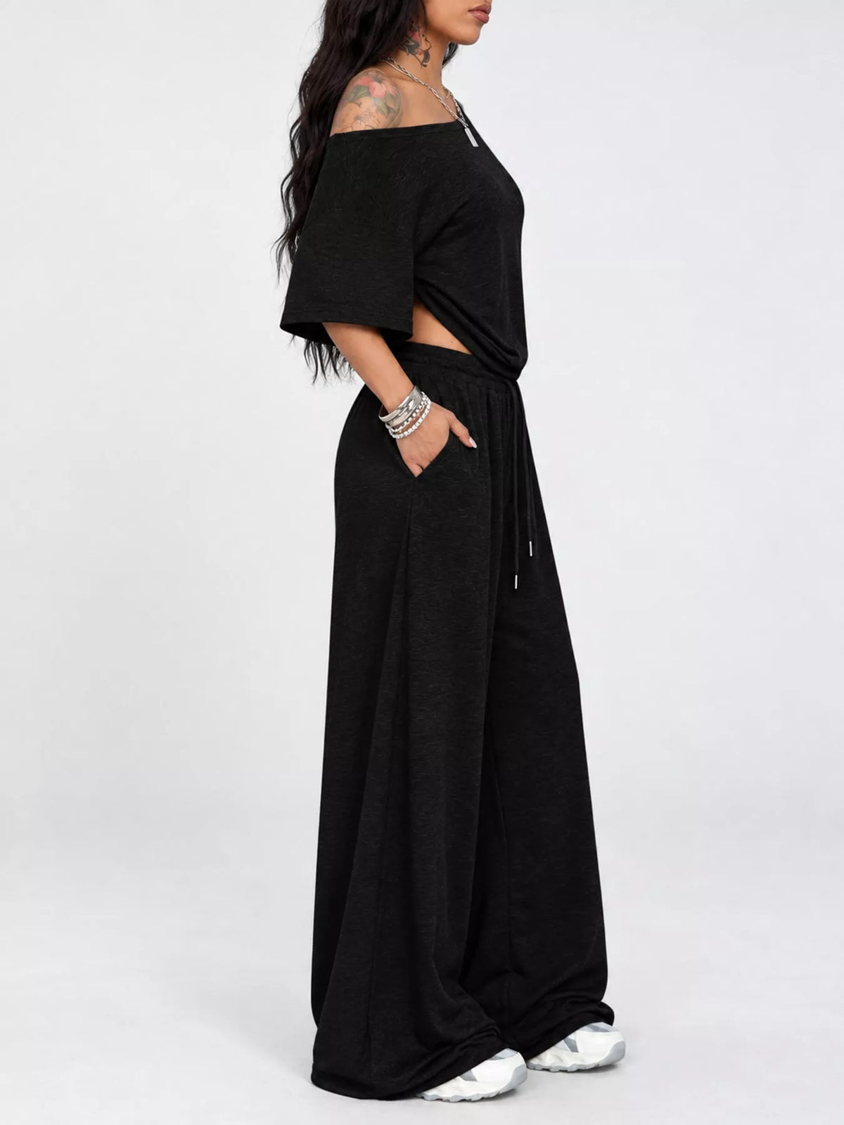 Linnea Off-Shoulder Top + Wide-Leg Pants Set in Black, on model