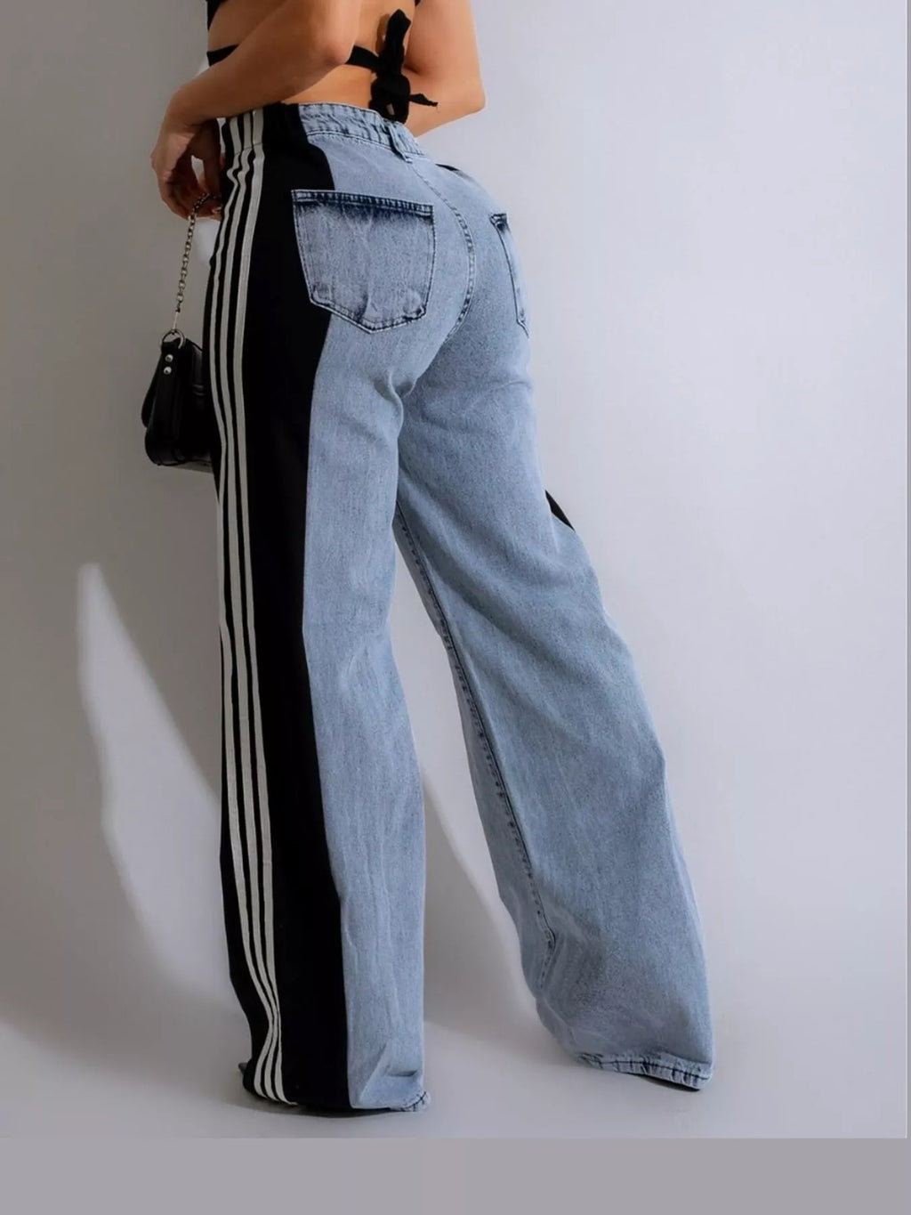 Zoe Side-Stripe Wide-Leg Jeans in Black, on model