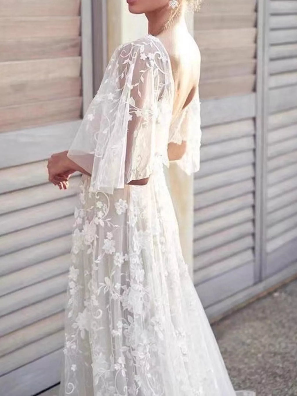 Viola Lace Flutter-Sleeve Maxi Dress in White, on model