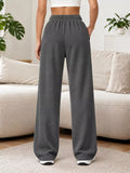Odessa Drawstring Wide-Leg Sweatpants in Dark Gray, on model
