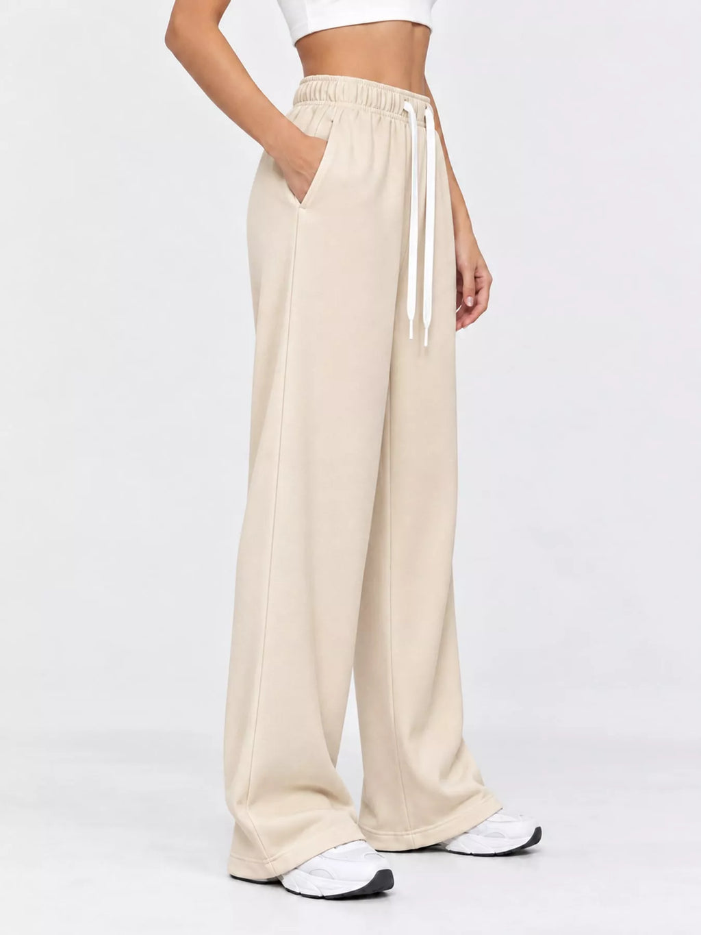 Odessa Drawstring Wide-Leg Sweatpants in Apricot, on model