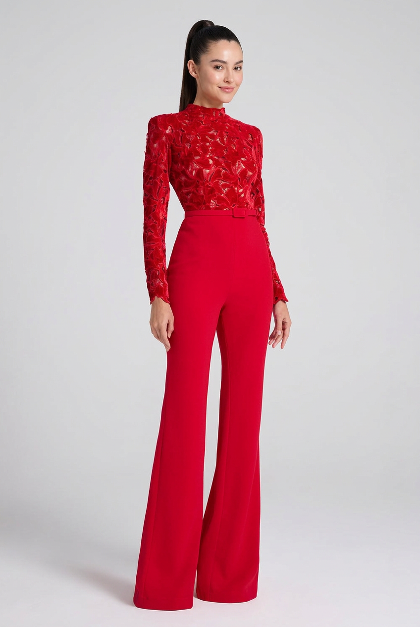 Youthful adult model wearing the Scarlett red lace long-sleeve flare jumpsuit.